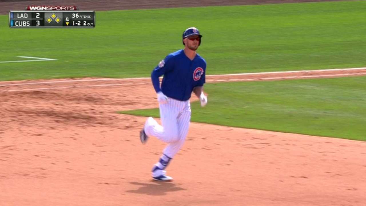 Bryant's slam powers Cubs in Hendricks' debut